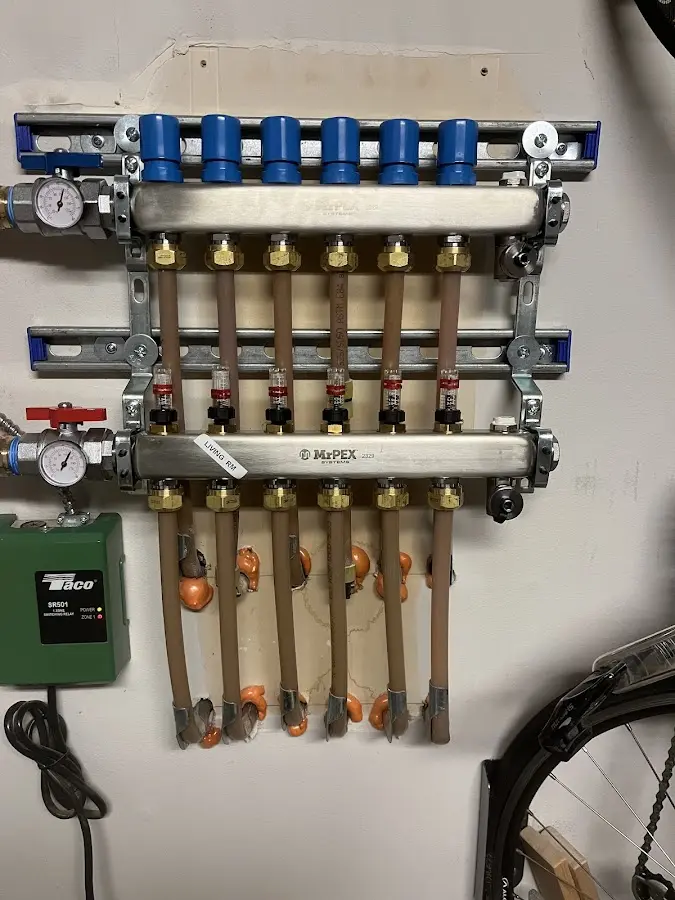 Plumber performing Leak Detection at a residential property in Roy